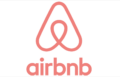 The image shows the Airbnb logo, featuring a stylized looped "A" icon above the word "airbnb" in pink text.